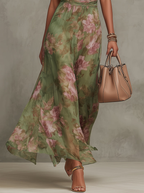 Serena – Elegant Maxiklänning i chiffong med blommönster och halterneck